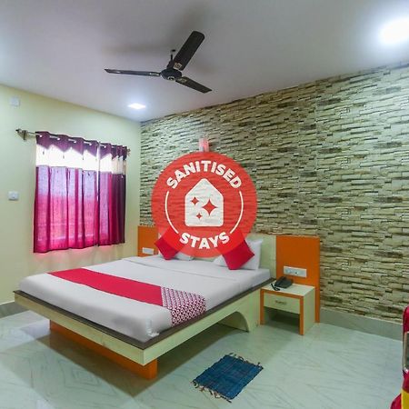 Oyo 60771 New Puri Hotel Bagian luar foto